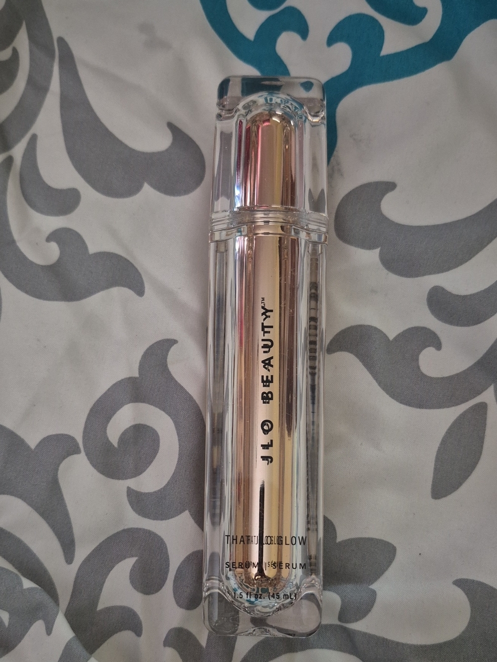 JLO Beauty That Glow Serum — Gold-Toned Highlighter